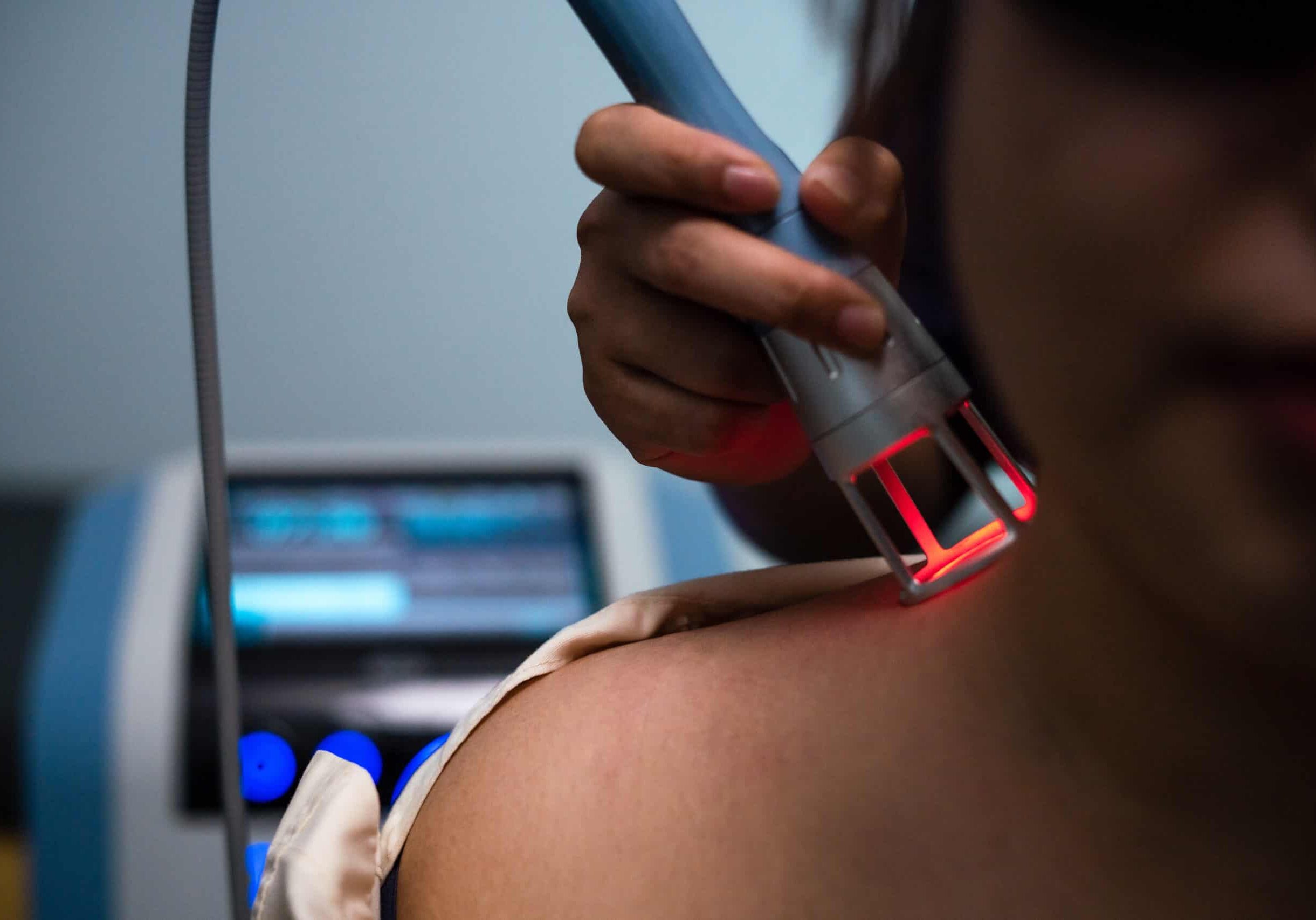 close up image with high power laser treatment for office syndrome patient